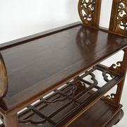 Wardrobe with Asian coat made of wood carved with dragons