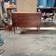 Vintage commode with tapered legs.