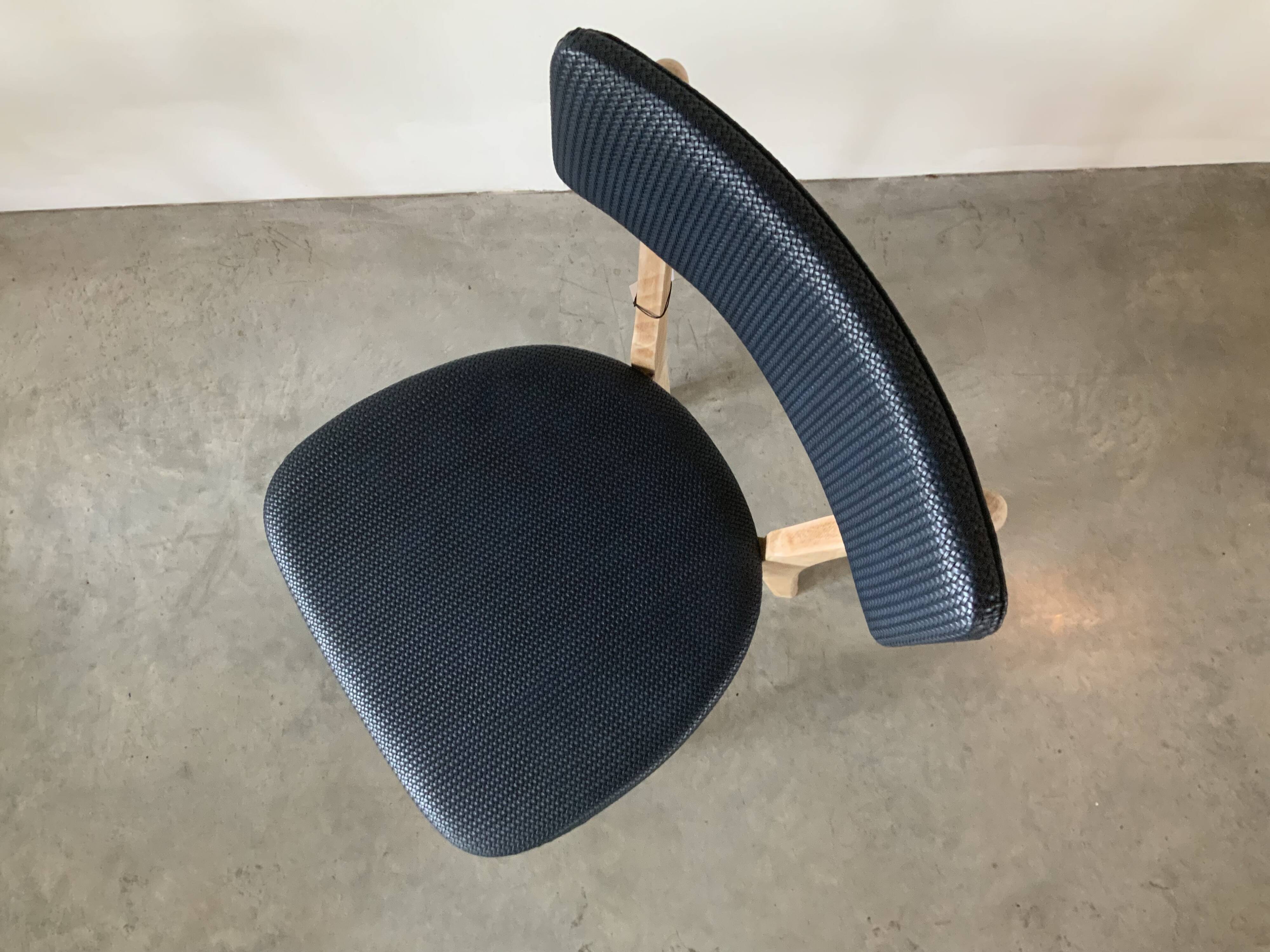 Restored vintage chair in midnight blue vinyl from the 50s