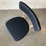 Restored vintage chair in midnight blue vinyl from the 50s