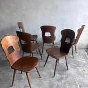 Set of six plywood dining chairs by Baumann, France, 1950s.
