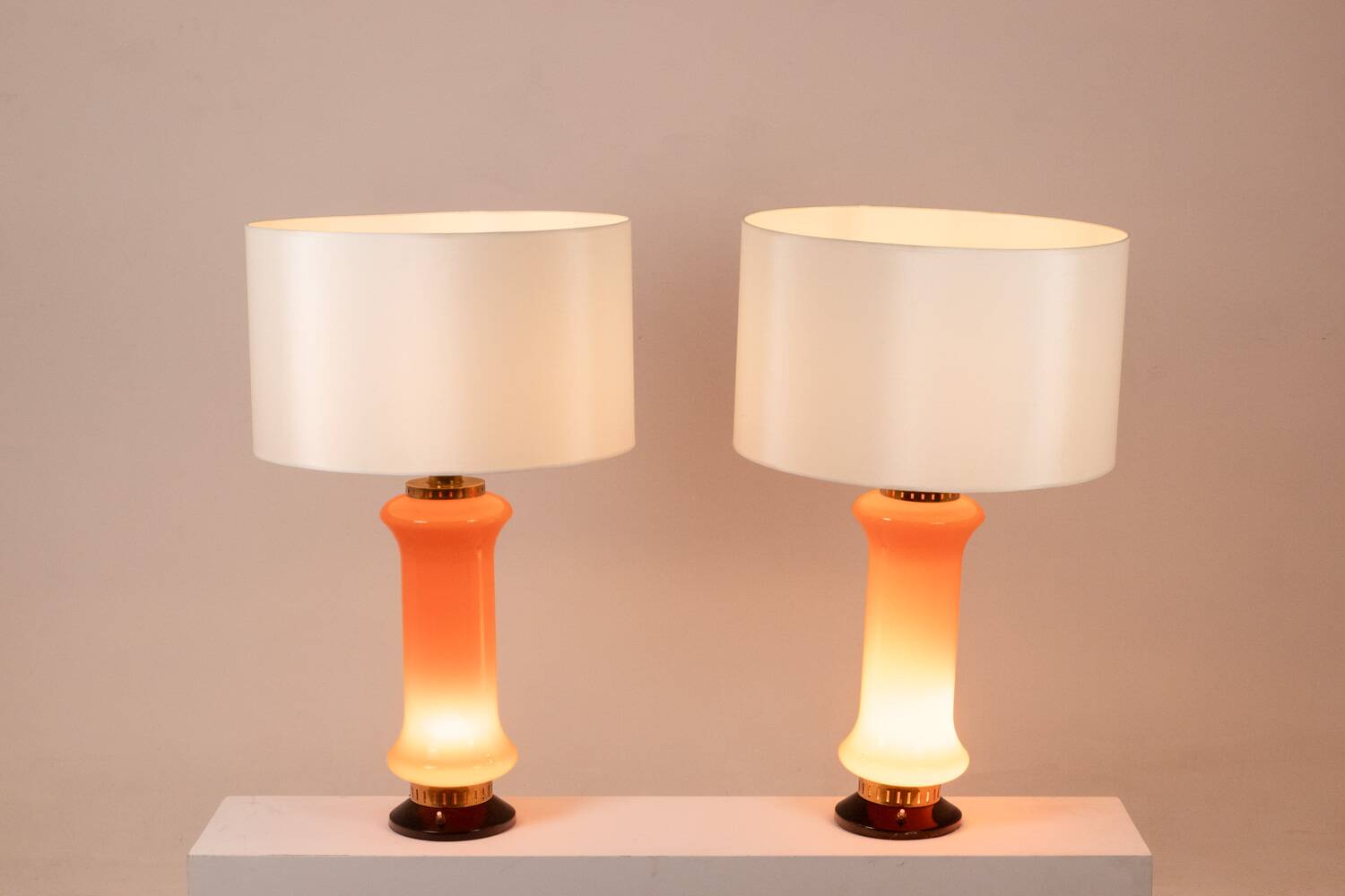 Pair of orange glass lamps. 1970s.