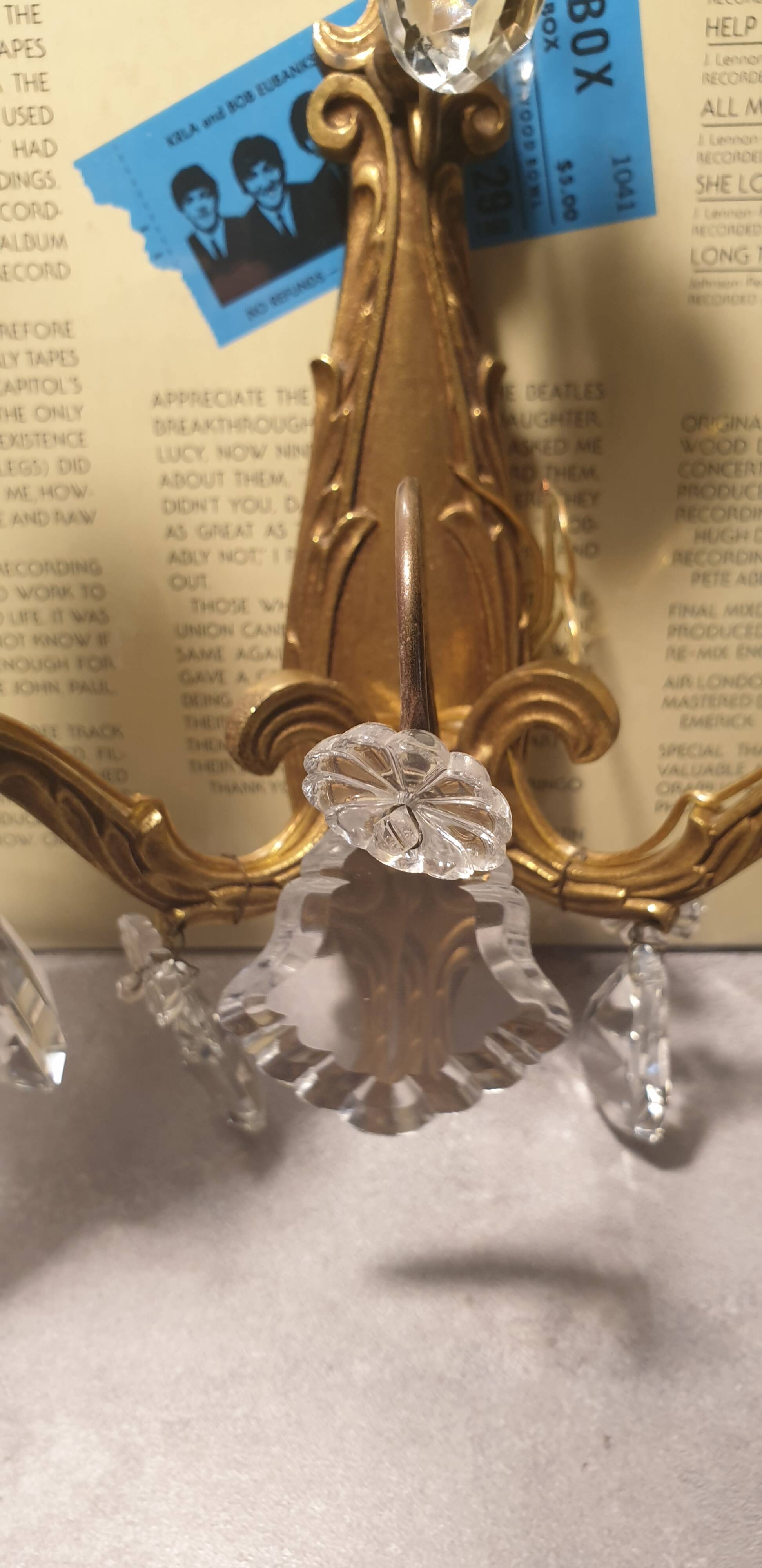 1 crystal prism wall light with 2 lights. Brass frame