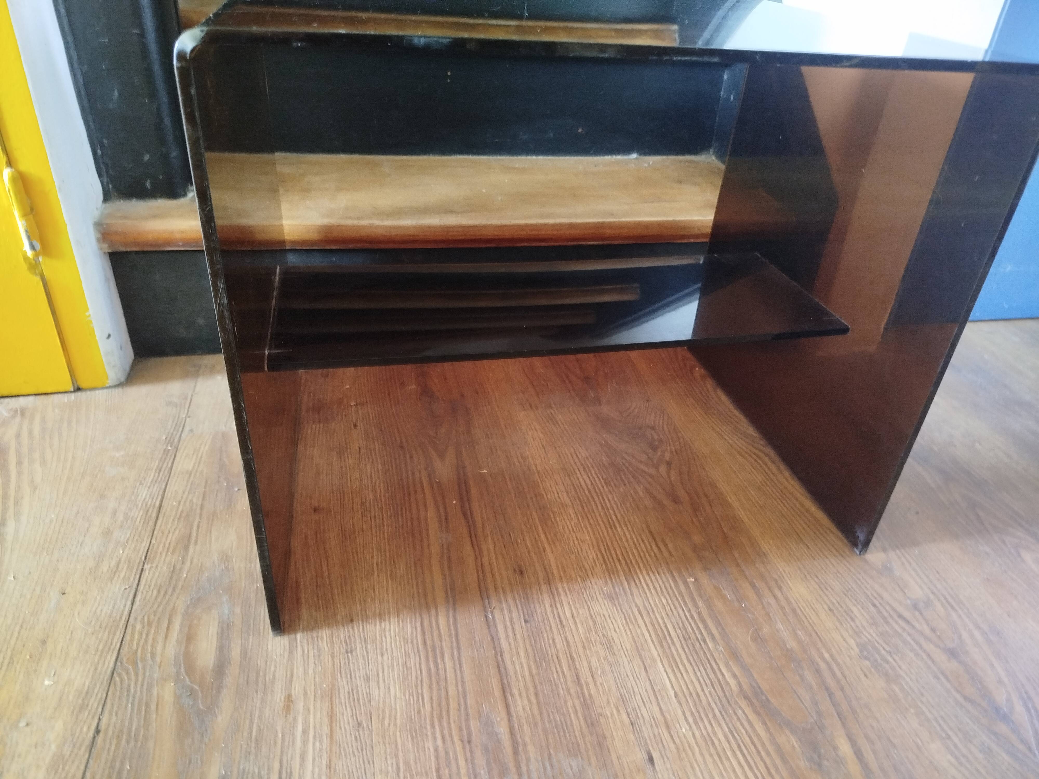 Coffee table / accent piece by Michel Dumas in smoked plexiglass – year