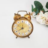 Old winding alarm clock