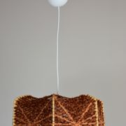 Brown wire and wood pendant light.