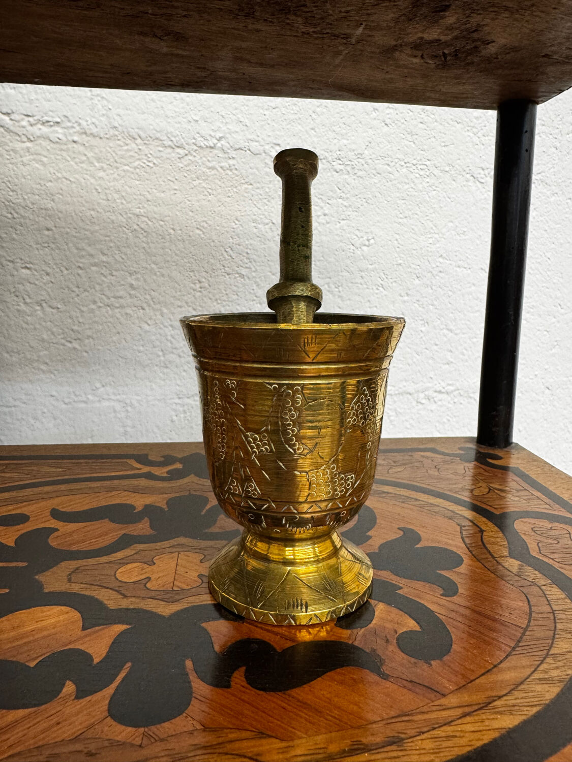 Golden brass mortar and pestle