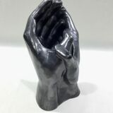 Vase with intertwined hands