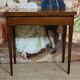 Louis XVI period game table in mahogany and marquetry.