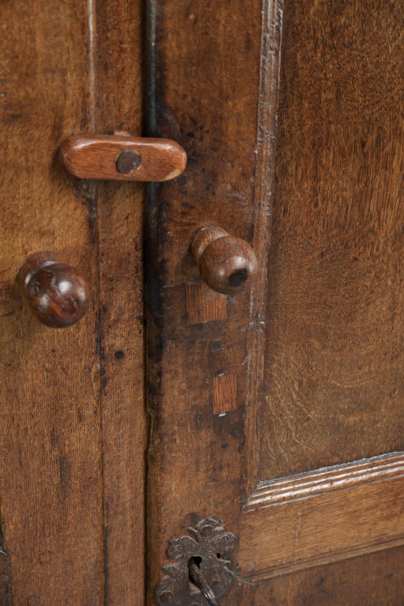 Antique oak farmhouse cupboard from the 17th century with original fittings