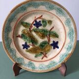 Old barbotine dessert plate. Floral patterns