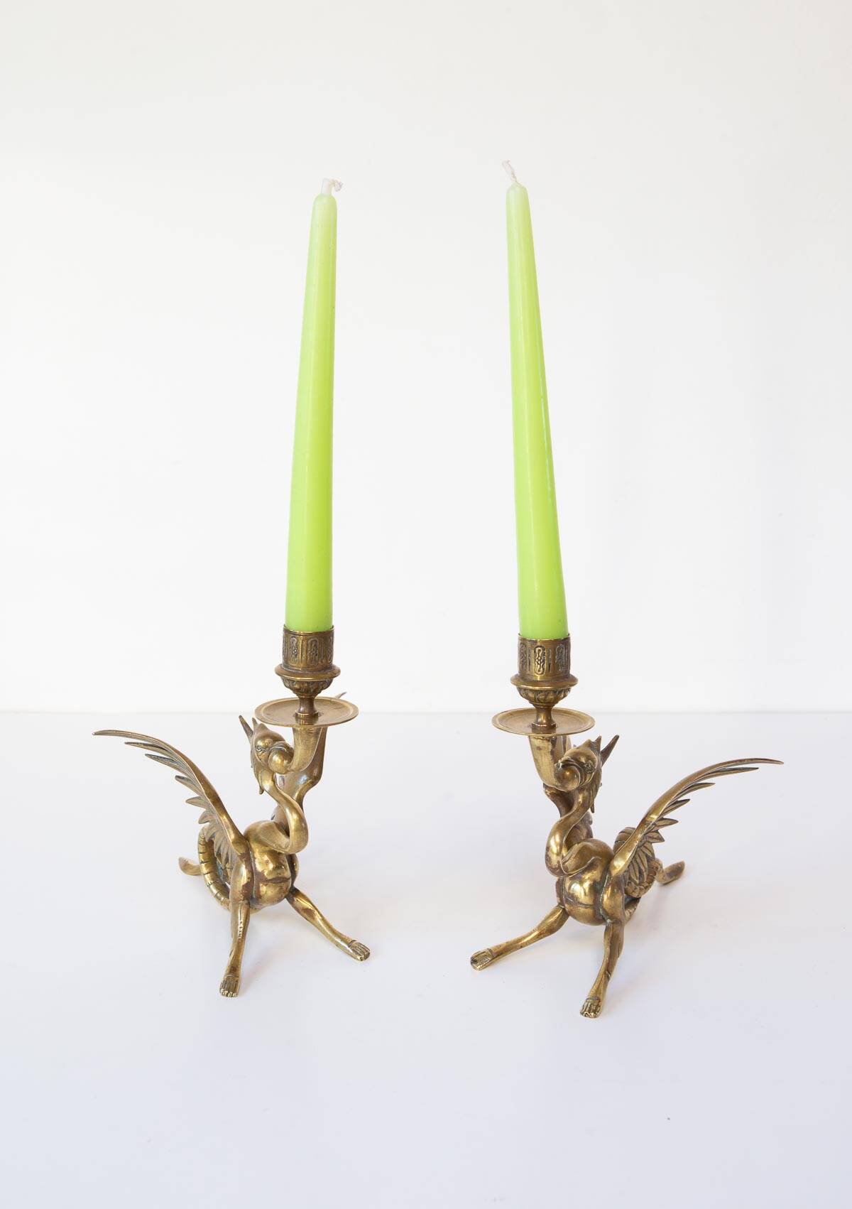Pair of 19th century gilded brass “chimera” candlesticks