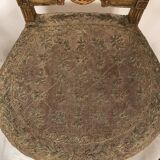 Series of three Louis XVI style chairs in gilded wood, circa 1900
