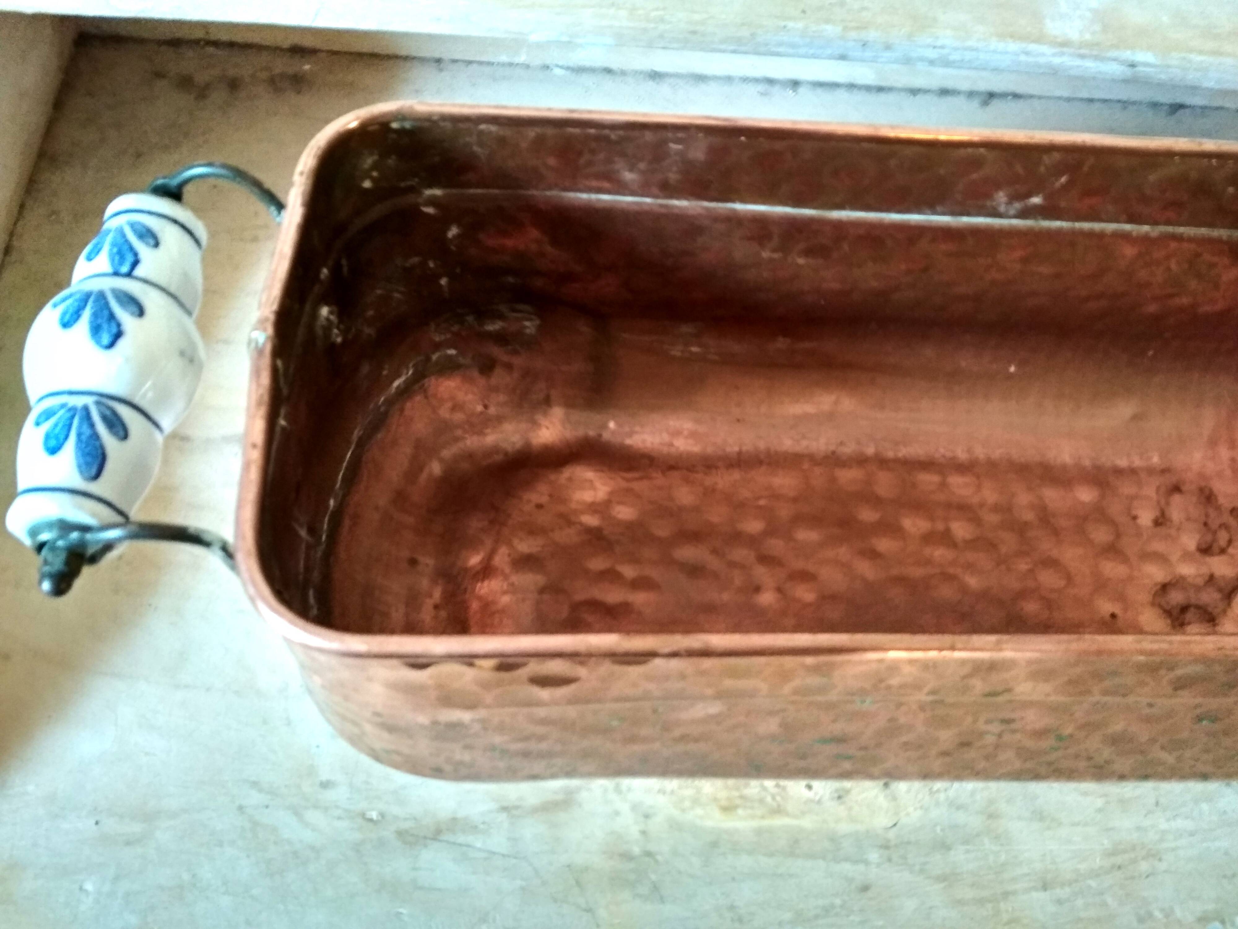 Large brass and copper planter, tray on 4 lion paw feet