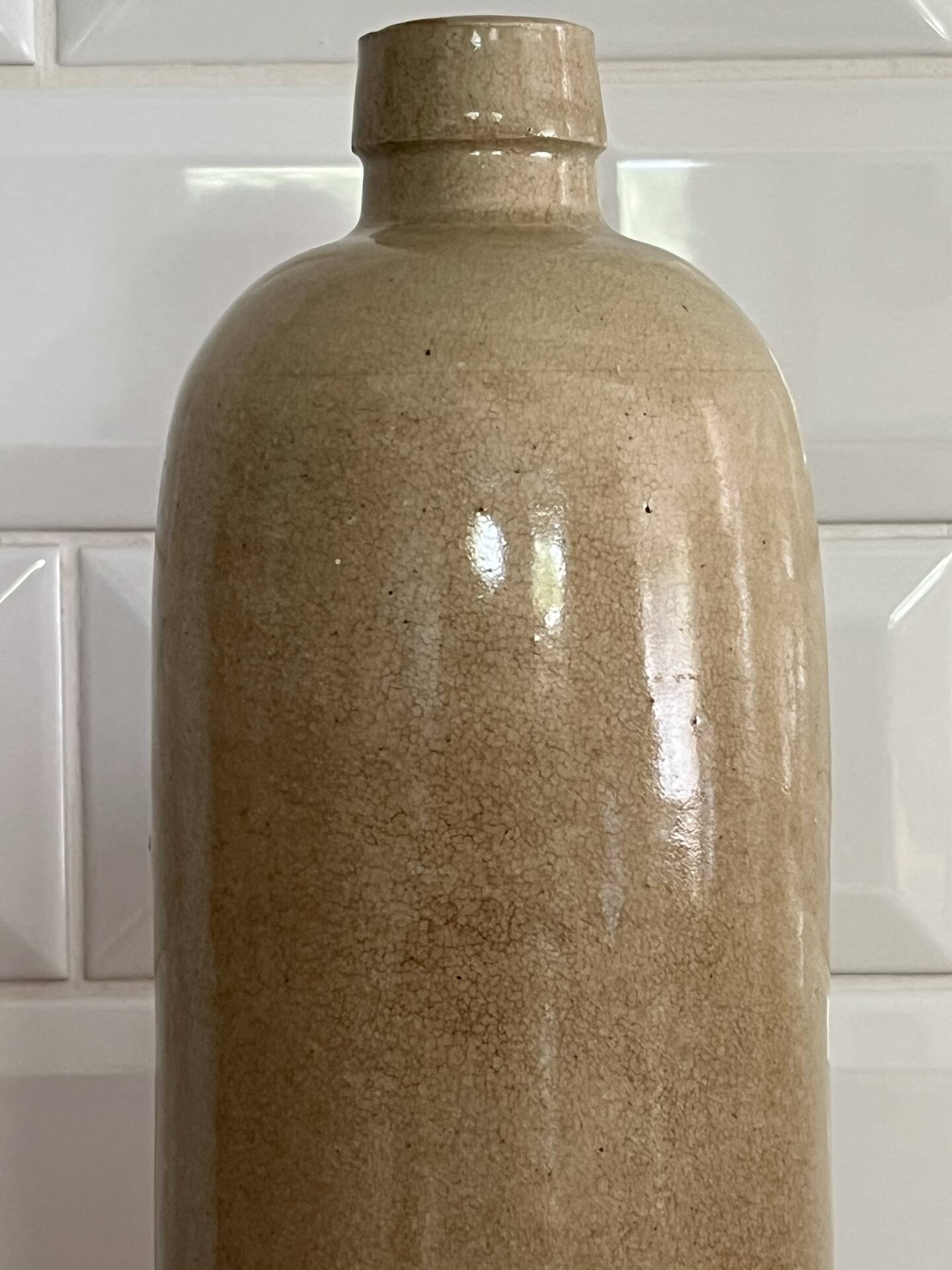 Beige stoneware bottle vase