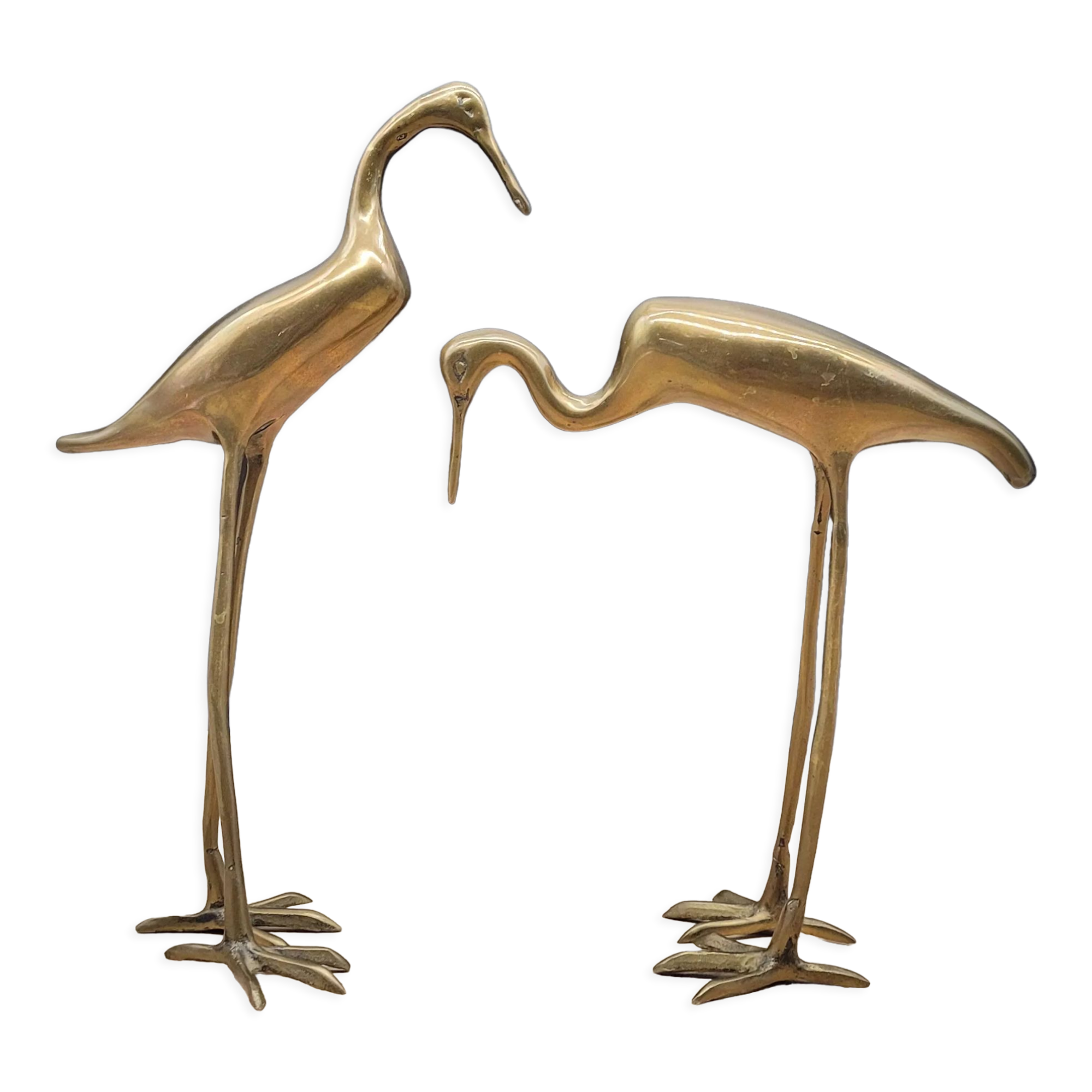 Duo brass herons