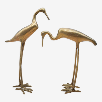 Duo brass herons