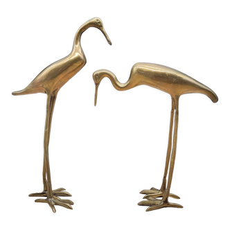 Duo brass herons