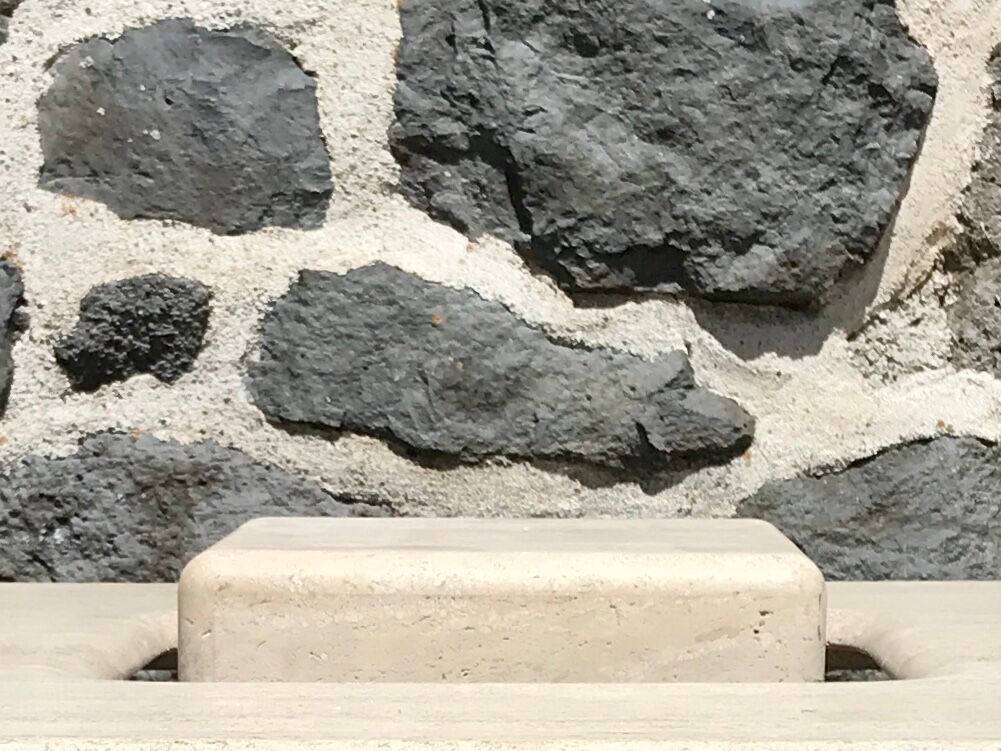 Sculptural travertine coffee table