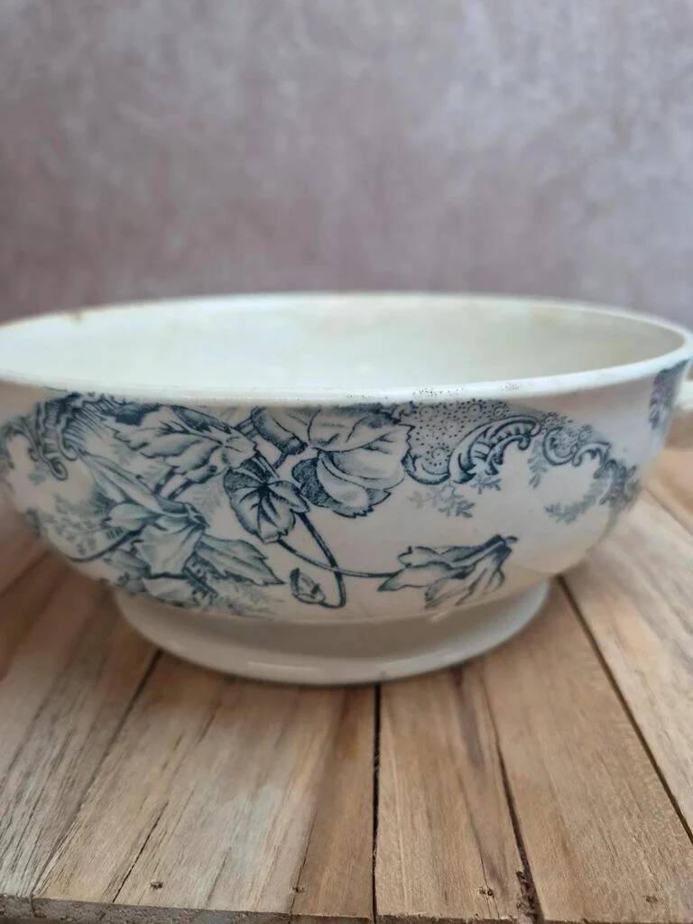 Antique ironstone soup tureen Clairefontaine with blue cyclamen decoration.