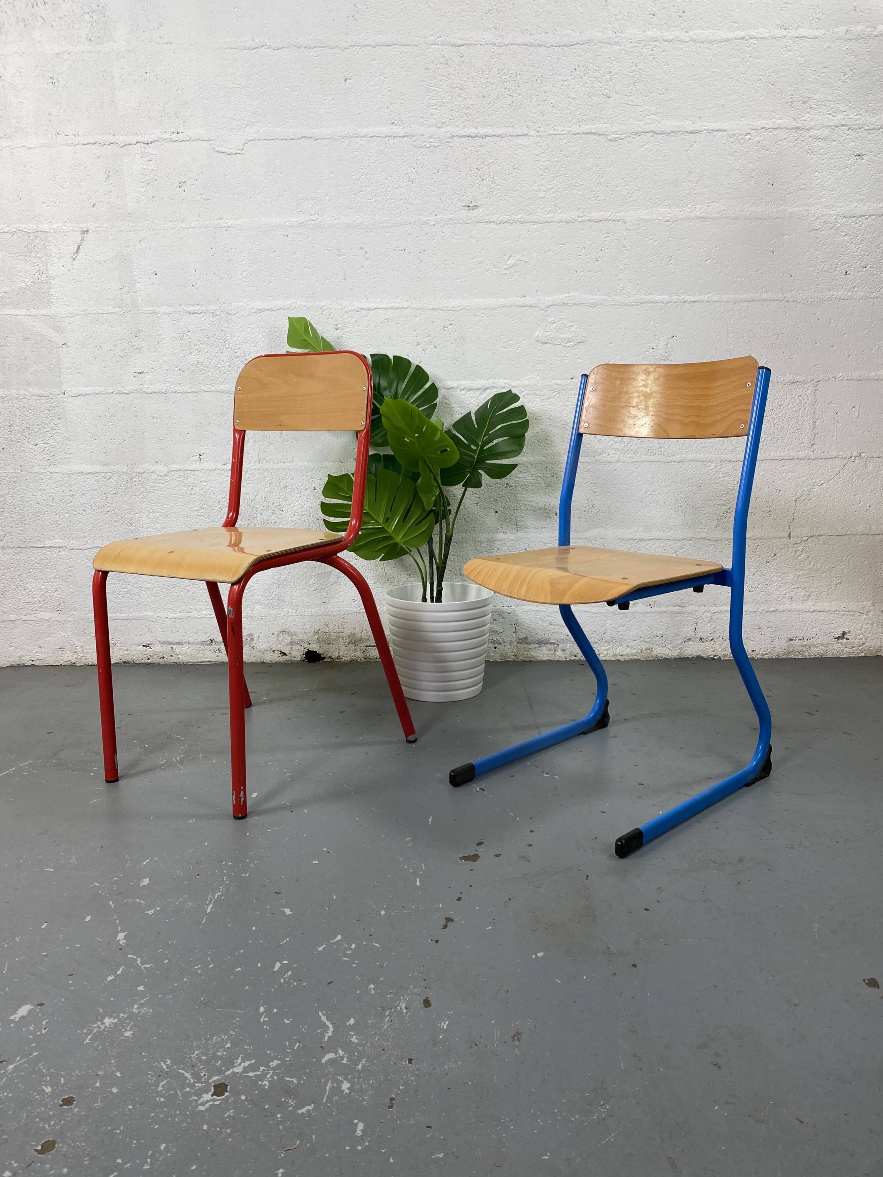 Set of 2 mismatched industrial school chairs