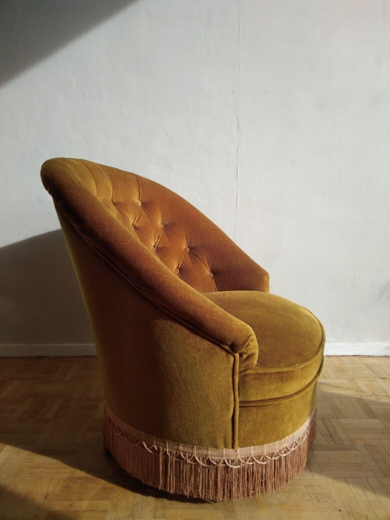 Fauteuil crapaud en velours doré