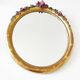 Miroir en bois doré avec fleurs