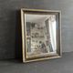 Miroir Napoléon III en bois noir et doré, XIXe siècle