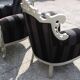A pair of vintage armchairs, 1980s, lacquered wood and fabric