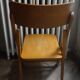 Vintage folding wooden heater chair
