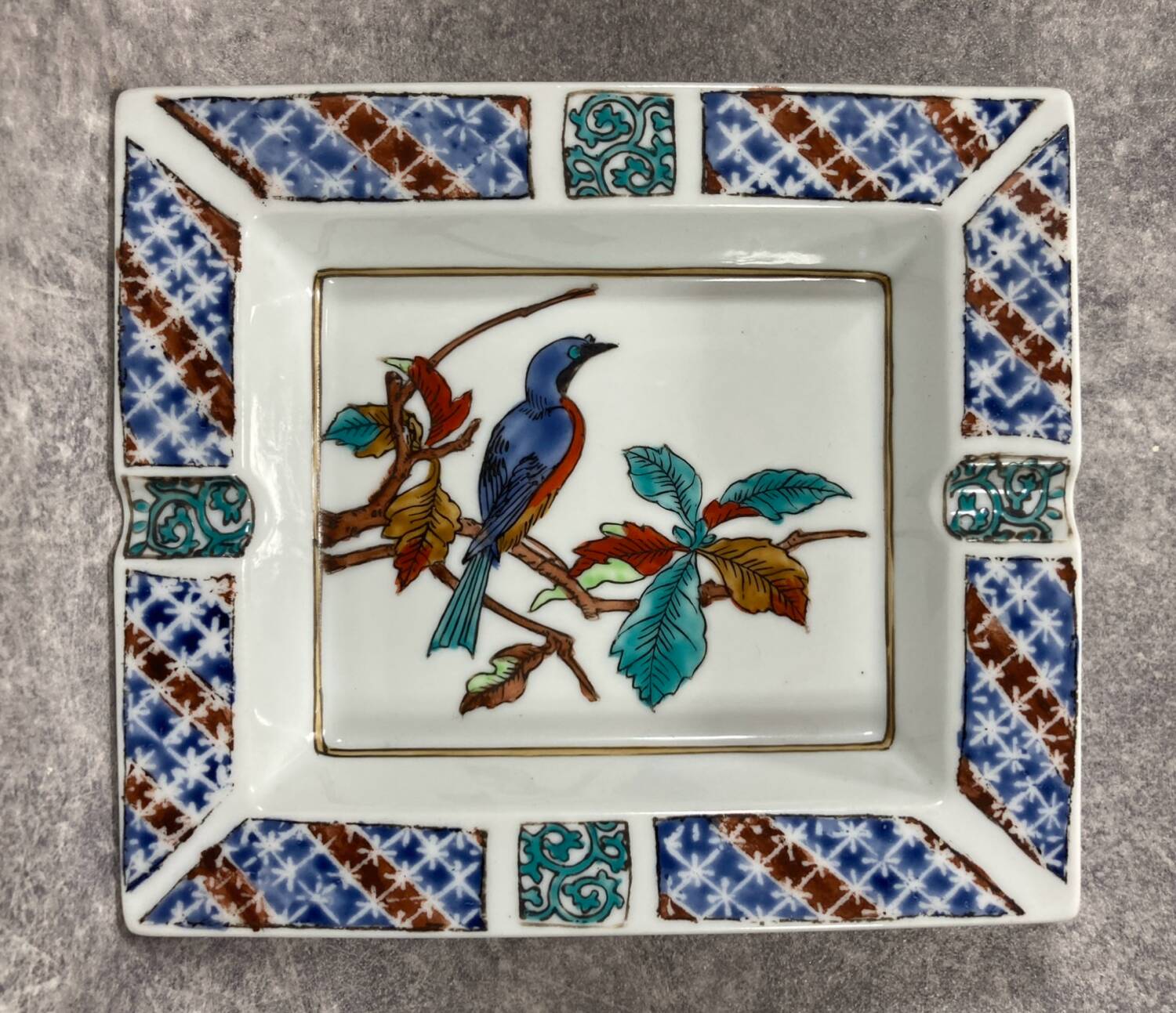 Ashtray. Trinket dish. Japanese porcelain. Blue bird on an autumn branch