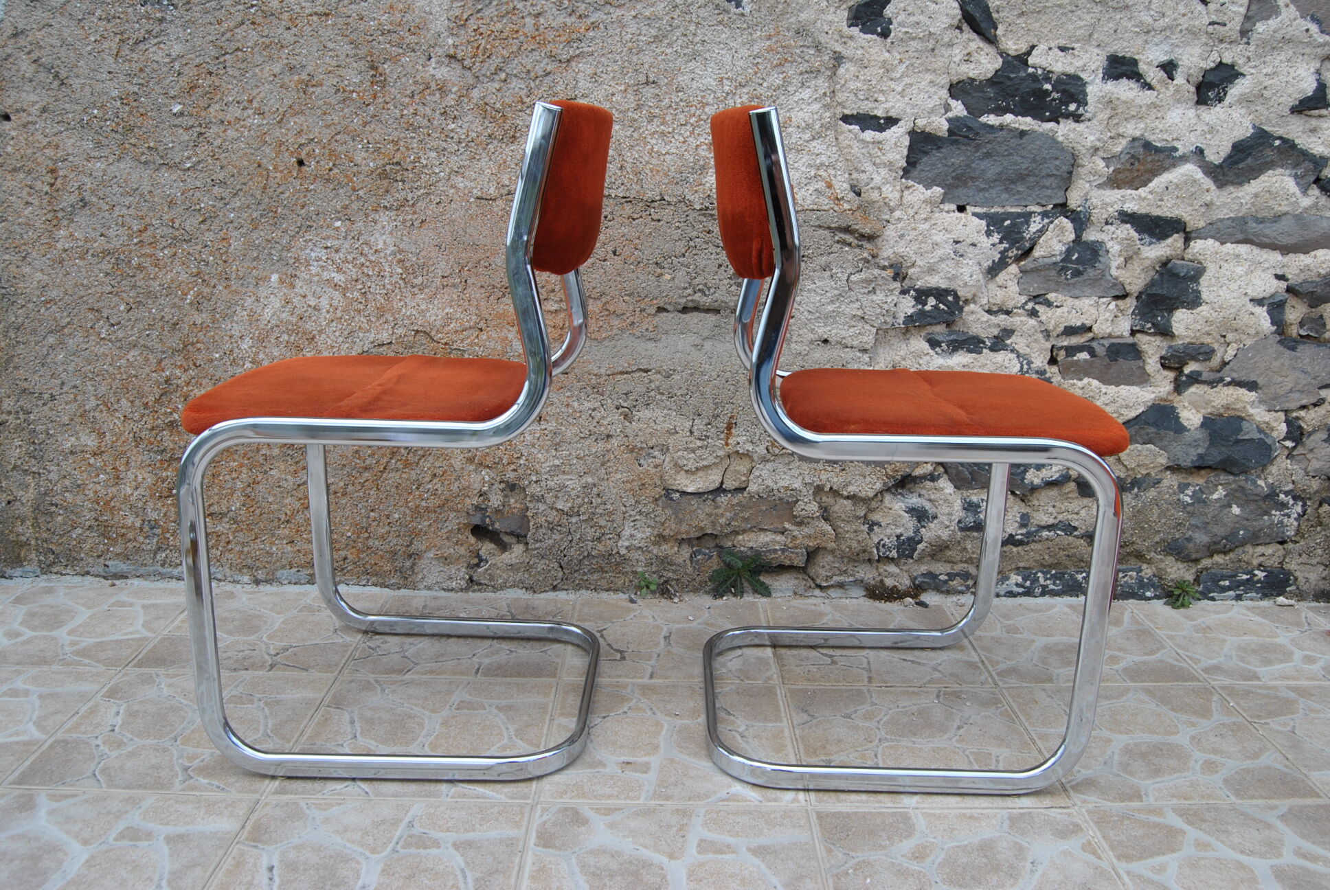 Pair of orange velvet chairs Roche Bobois 70s