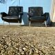 2 vintage faux leather armchairs