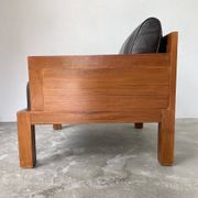 Fauteuil moderniste bois exotique et cuir