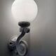 Cast iron and opaline wall lights from the 70s