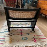 Teak and cane armchair