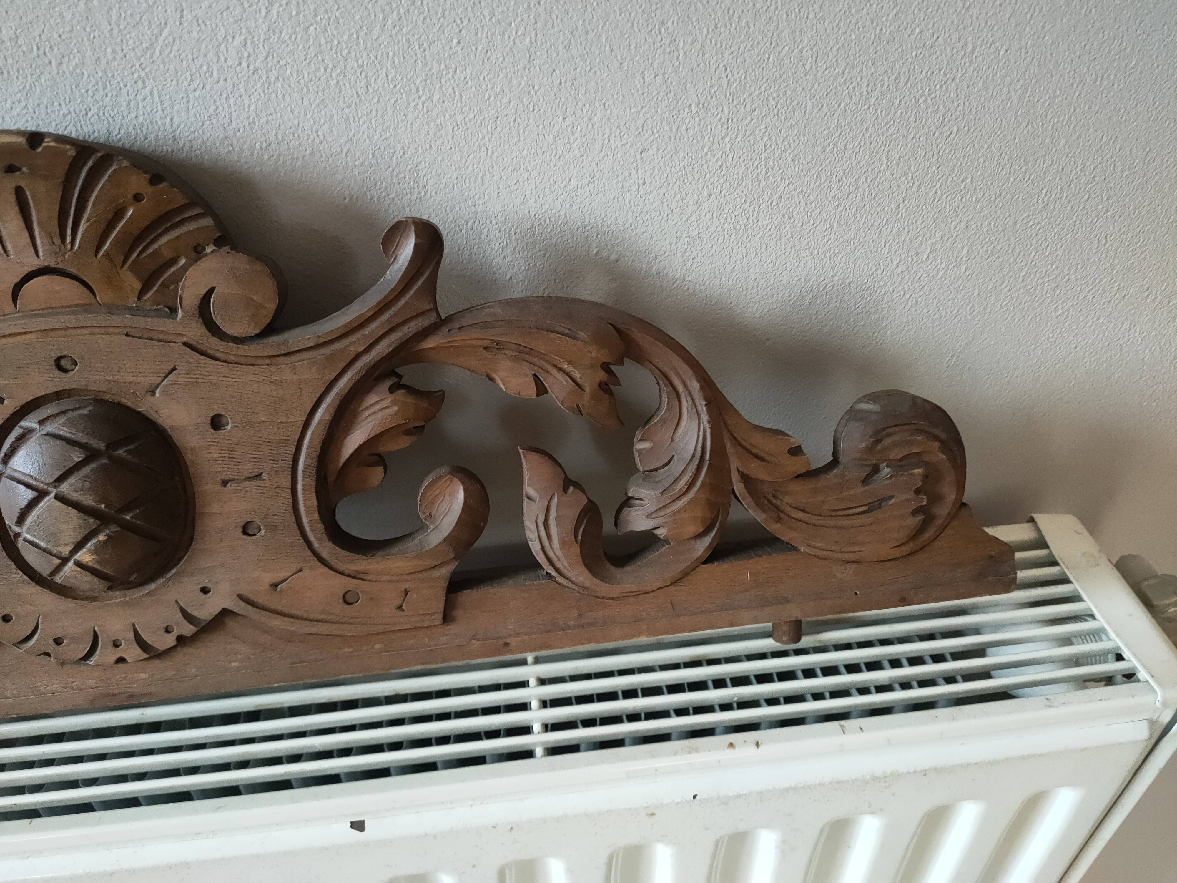 Old carved wooden pediment