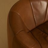 "Pumpkin" 3-seater canapé in patinated brown leather by Pierre Paulin for Arti.