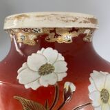 Pair of antique vases with butterfly and flower motif.