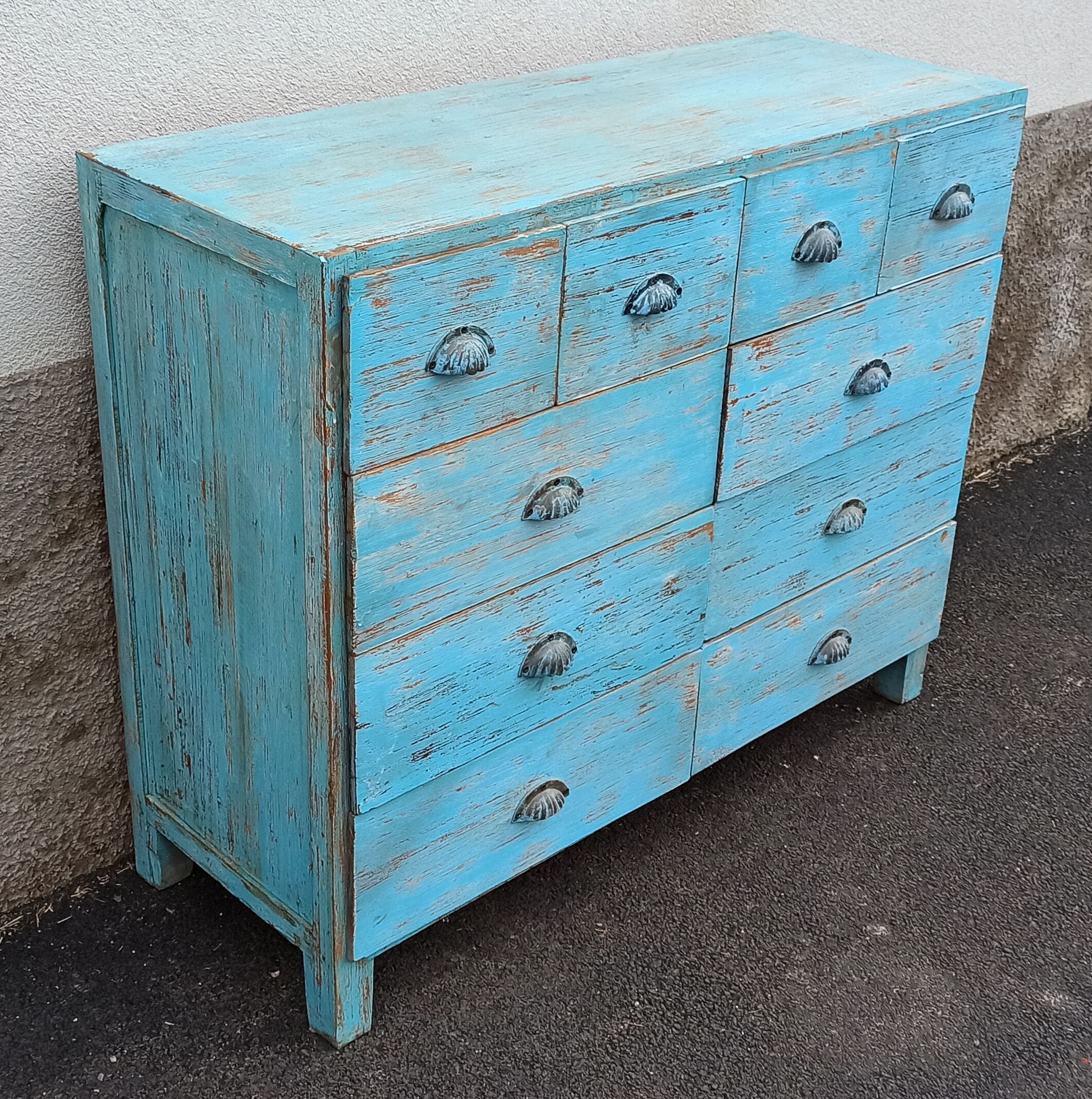 Blue wooden dresser with drawers