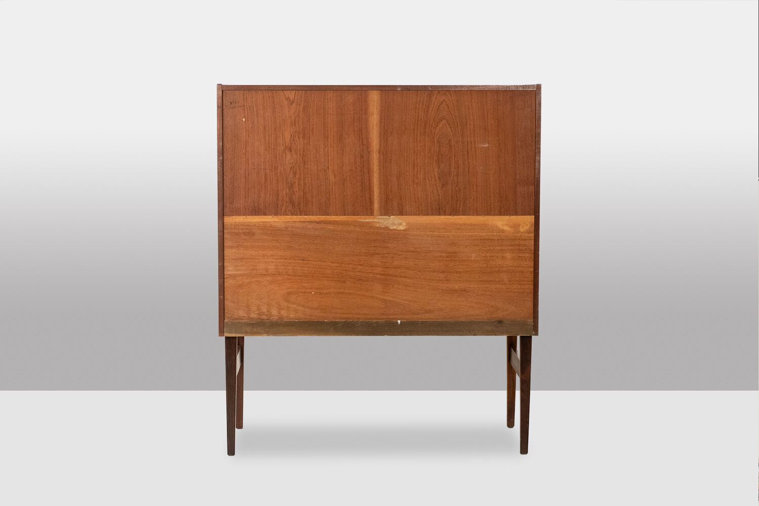 Rosewood chest of drawers with 2 drawers, forming a secretary. 1970s.