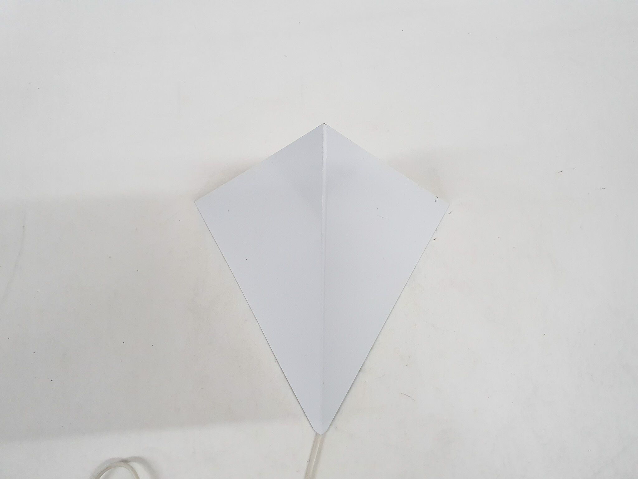 White metal wall light in good condition. By Anvia, The Netherlands.