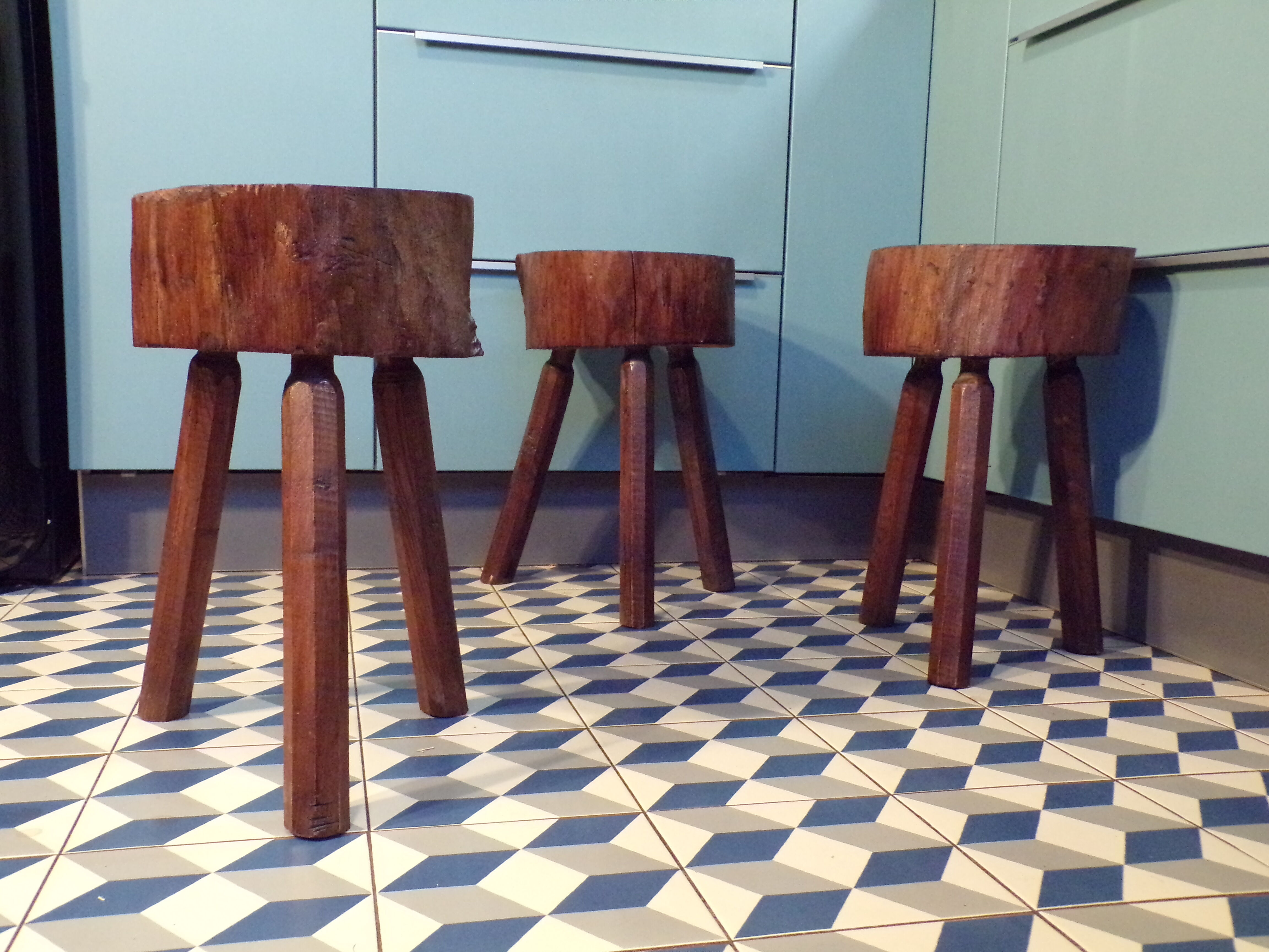 Trio of brutalist tripod stools