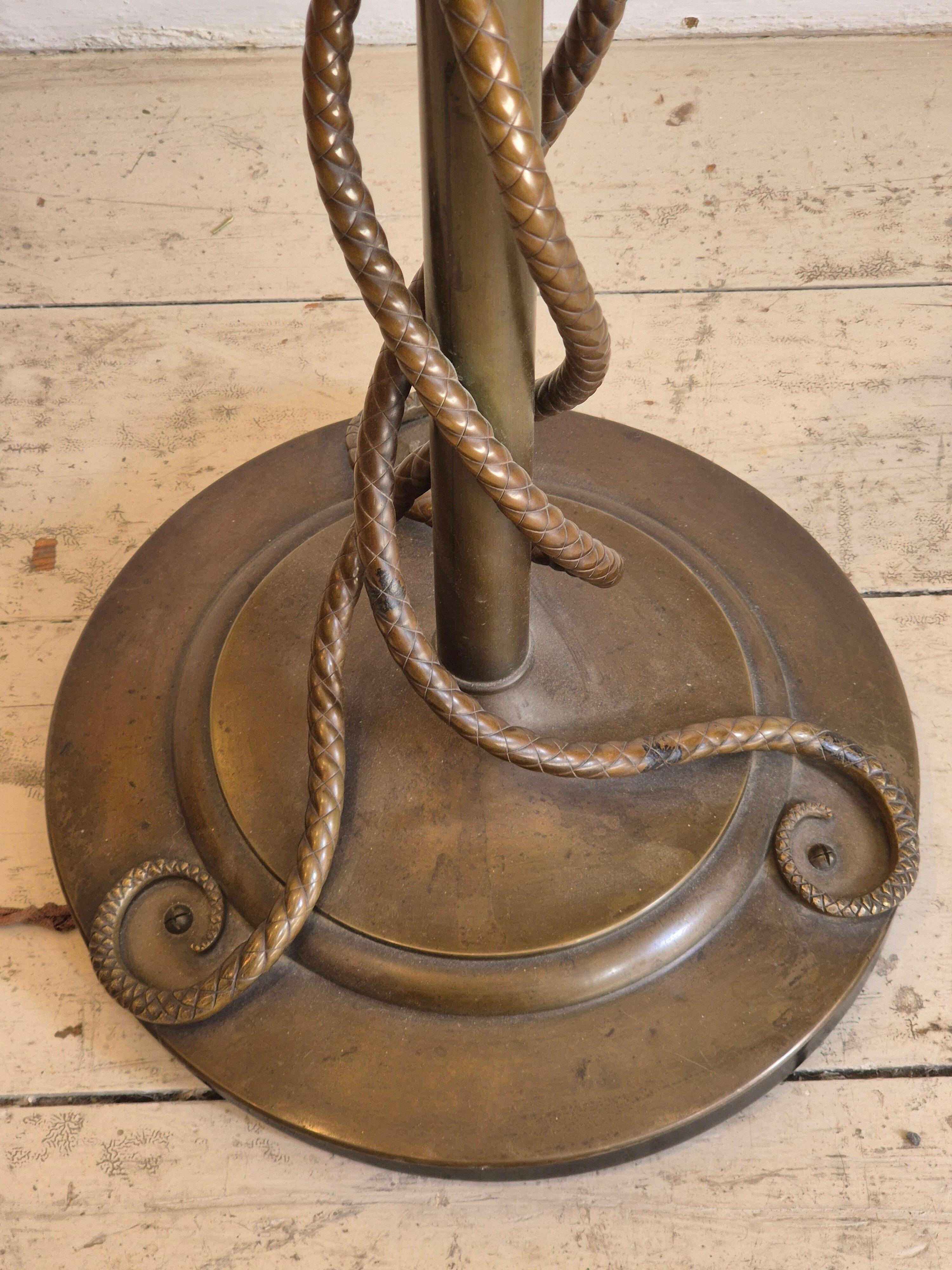 Rare and exquisite bronze floor lamp with intertwined snakes, early 1900s.