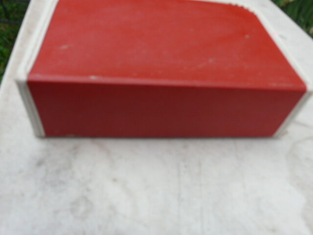 Red and white vintage child's suitcase