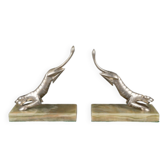 Pair of Art Deco 1930 panther bookends in silvered bronze on onyx