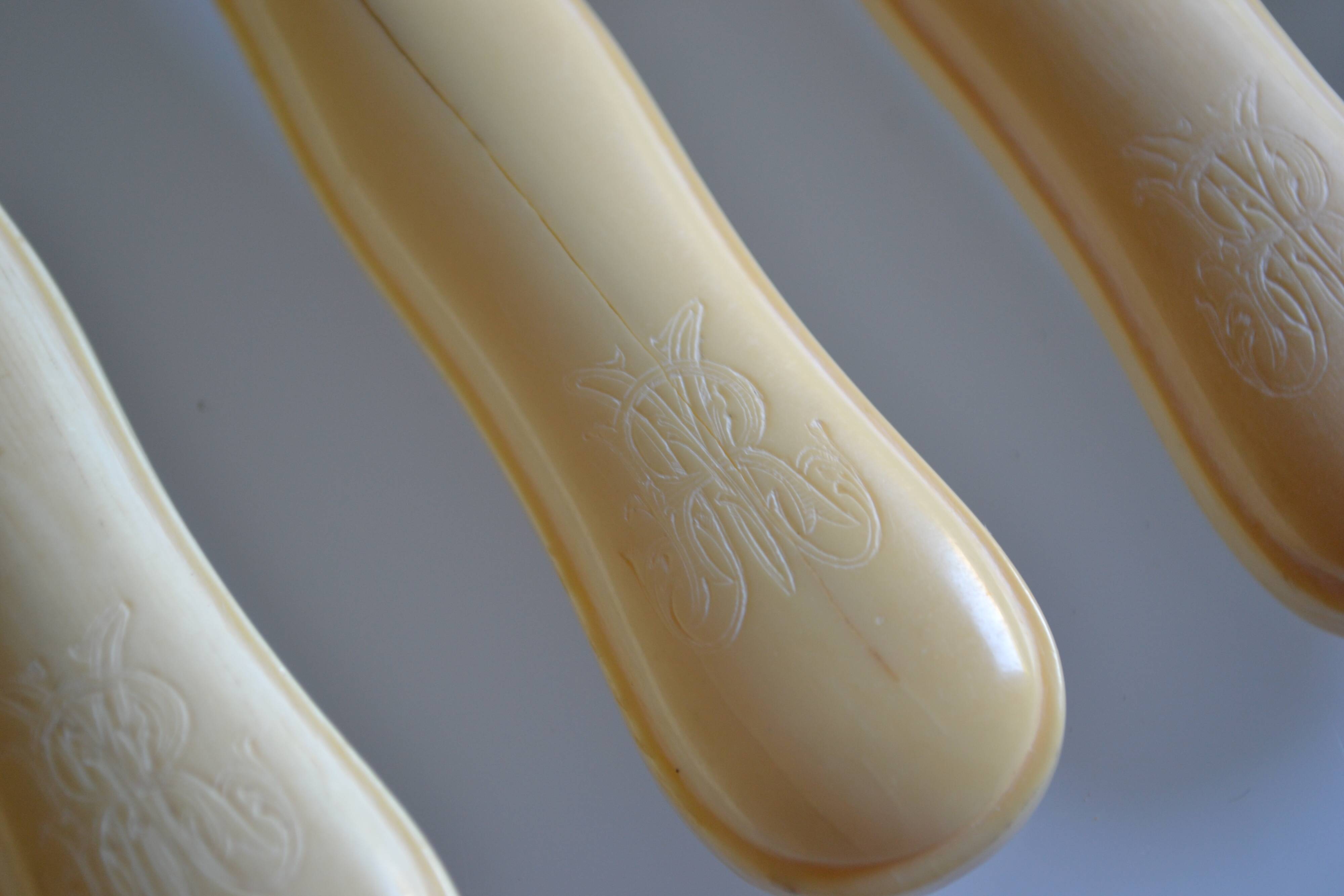 7 old table knives from the 19th century, monogrammed ivory-colored handles