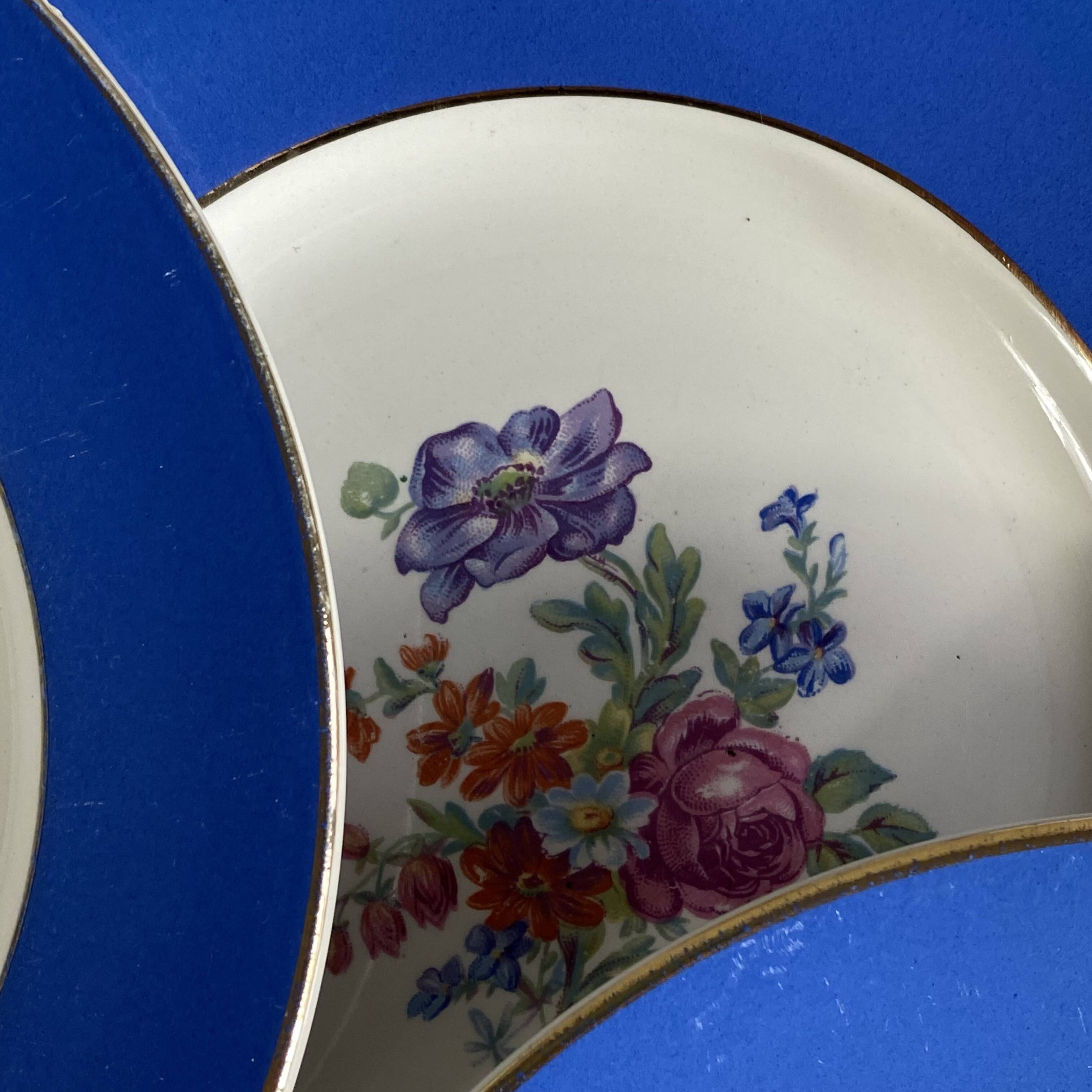 6 blue antique earthenware plates with flowers and gilding from Saint Amand Hamage.