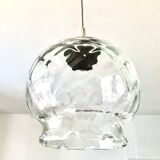 Suspension with transparent checkered glass steering wheels