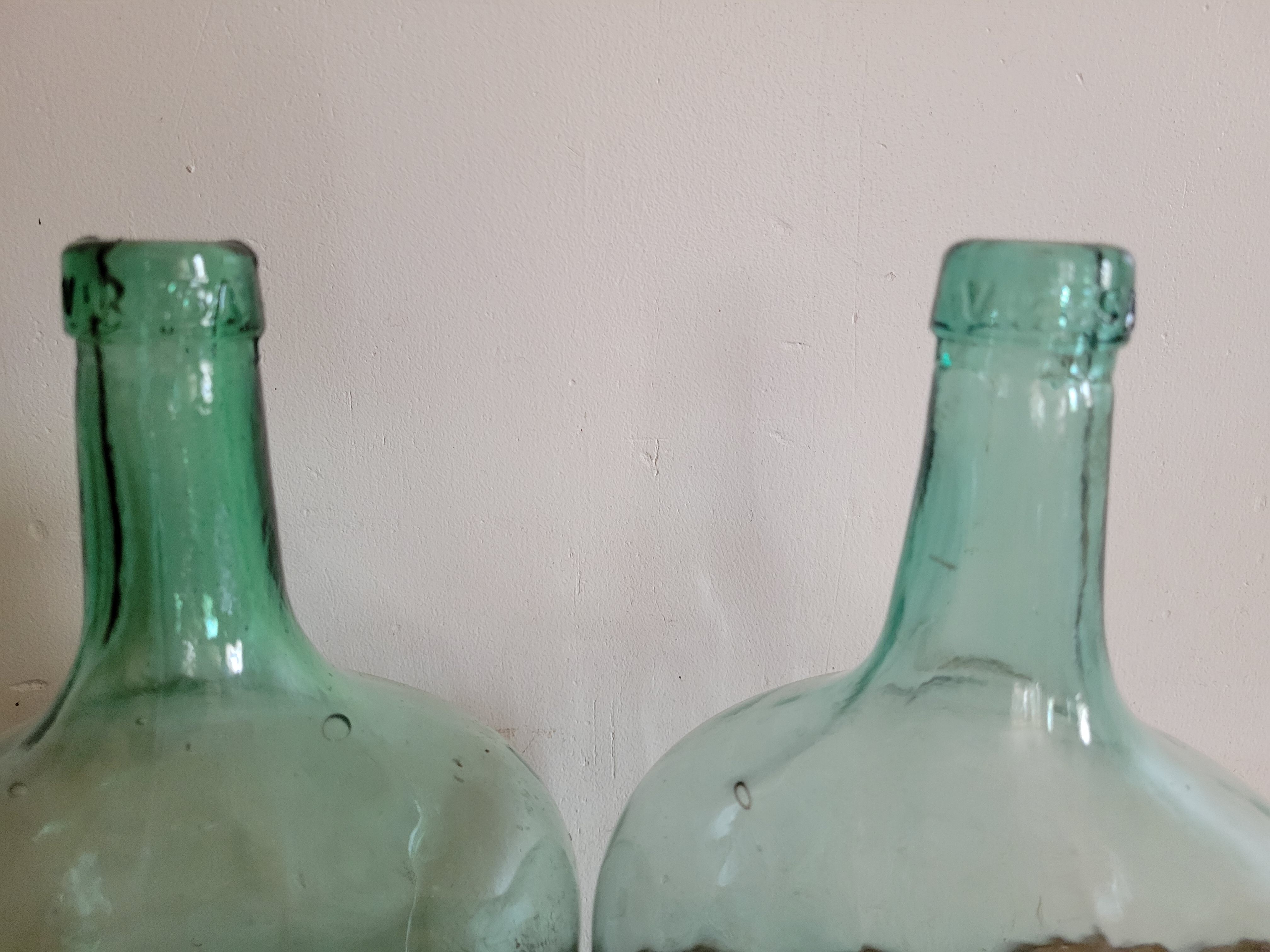 Pair of demijohns